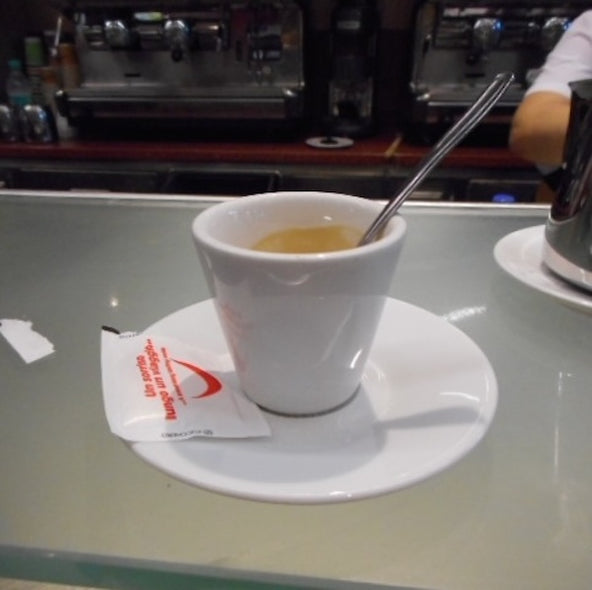 Hollett-Bazouzi, Linda Title: Espresso at McDonald's, the Train Station in La Spezia, Italy