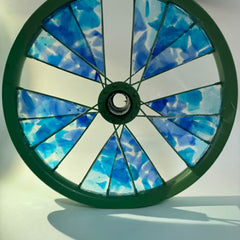 Jennifer Webb Title: Blue kids bike wheel