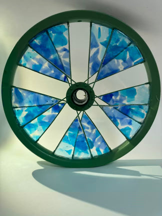Jennifer Webb Title: Blue kids bike wheel