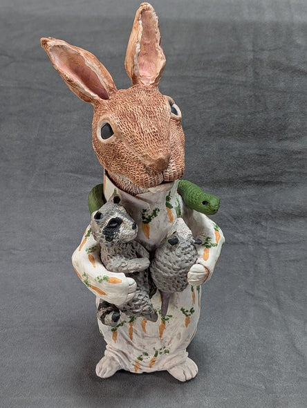 Debby Freed Title: Large Rabbit of Assisi with Snake Raccoon and Possum